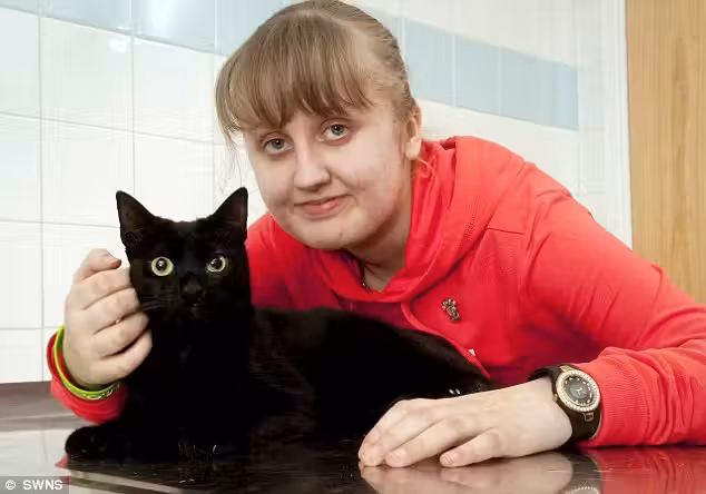perla_gata_menina