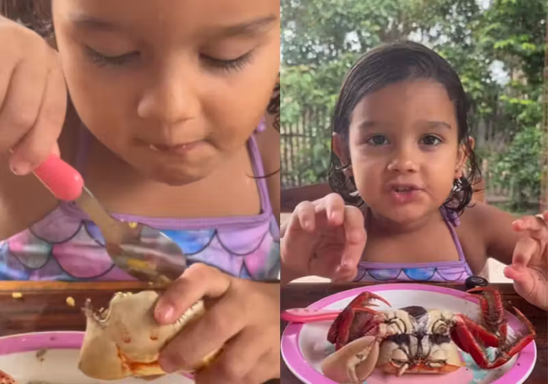 A menina Maria, do Pará, mostra como comer caranguejo com farinha da melhor forma possível. Vídeo foi visto 6 milhões de vezes. - Foto: @a.mariaeloisa2212/Instagram
