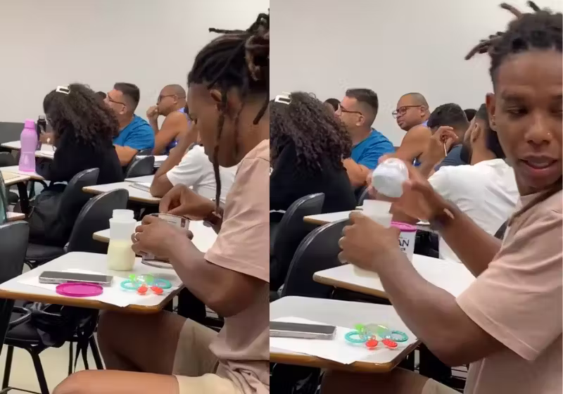 Everton, o pai de Salvador (BA), faz a mamadeira da filha durante as aulas na faculdade de Direito e tem apoio dos colegas e do professor. - Foto: @everttonnonato/Instagram