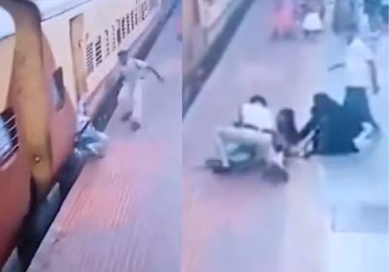Um policial age rápido e salva uma mulher que caiu no vão entre a ferrovia e o trem. - Foto: reprodução Independent Índia