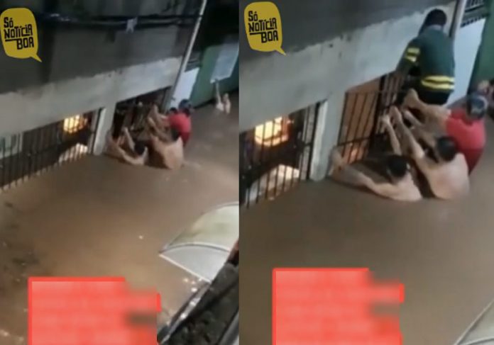 Vizinhos-enchente-close Vizinhos salvam rapaz preso na enchente - Foto: reprodução / TikTok