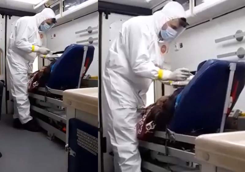 Bombeiro da comida na boca de paciente na ambulância - Foto: reprodução / Youtube