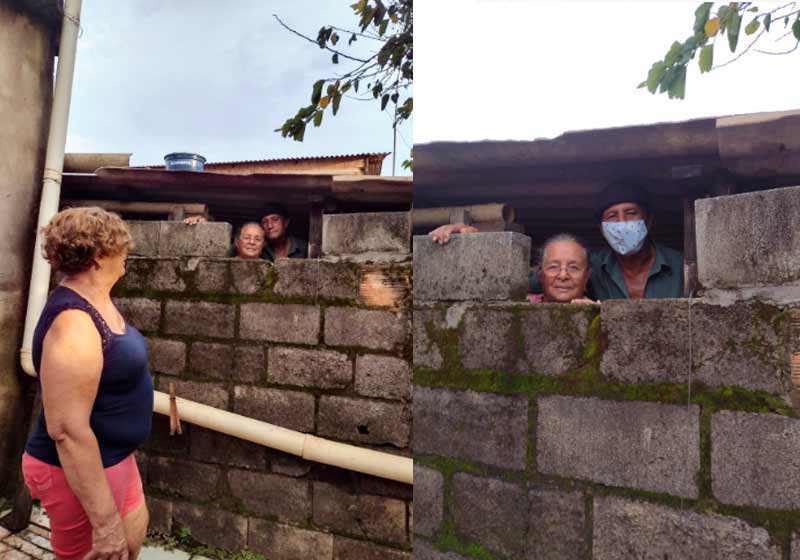 Vizinhos conversando pela janelinha feita no muro - Fotos: Taislayne Firmo dos Santos