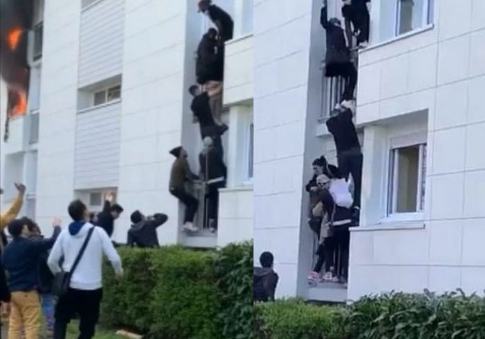 Jovens escalam prédio para salvar bebê - Fotos: Zenka Zekkar / Facebook