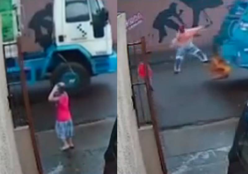 O coletor de lixo Kevin se encontrou com o menino que salvou de um atropelamento no PR - Fotos: câmera de segurança