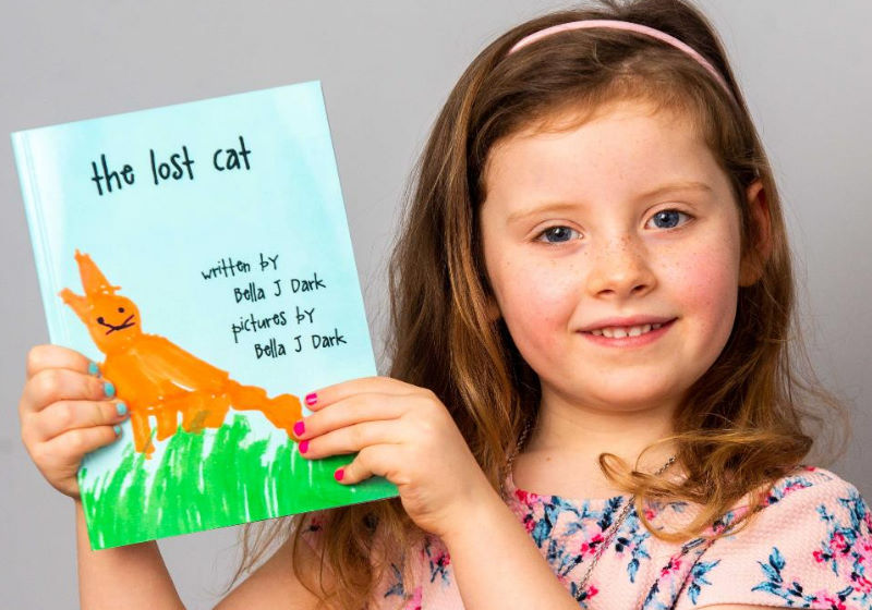 Bella J. Dark de 5 anos recebeu a confirmação oficial esta semana do Guinness depois de vender mais de 2.000 cópias. Ela é a mais jovem autora de livors. Foto: SWNS