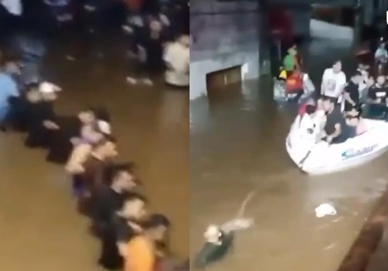 Voluntários de Canoas, no Rio Grande do Sul (RS), se organizaram em forma de corrente humana para salvar vítimas ilhadas. Foto: Reprodução/Twitter.