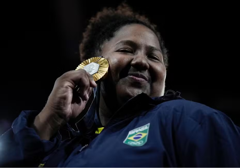 Beatriz Souza e sua medalha de ouro