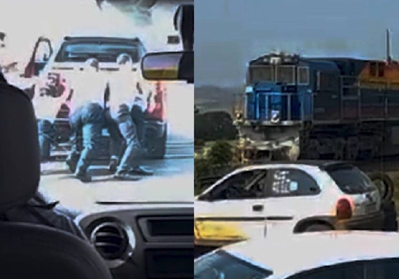 Pessoas desconhecidas se unem e empurram o carro enguiçado bem na linha do trem. A solidariedade evitou o pior em Ponta Grossa, no Paraná. - Foto: MassaNews