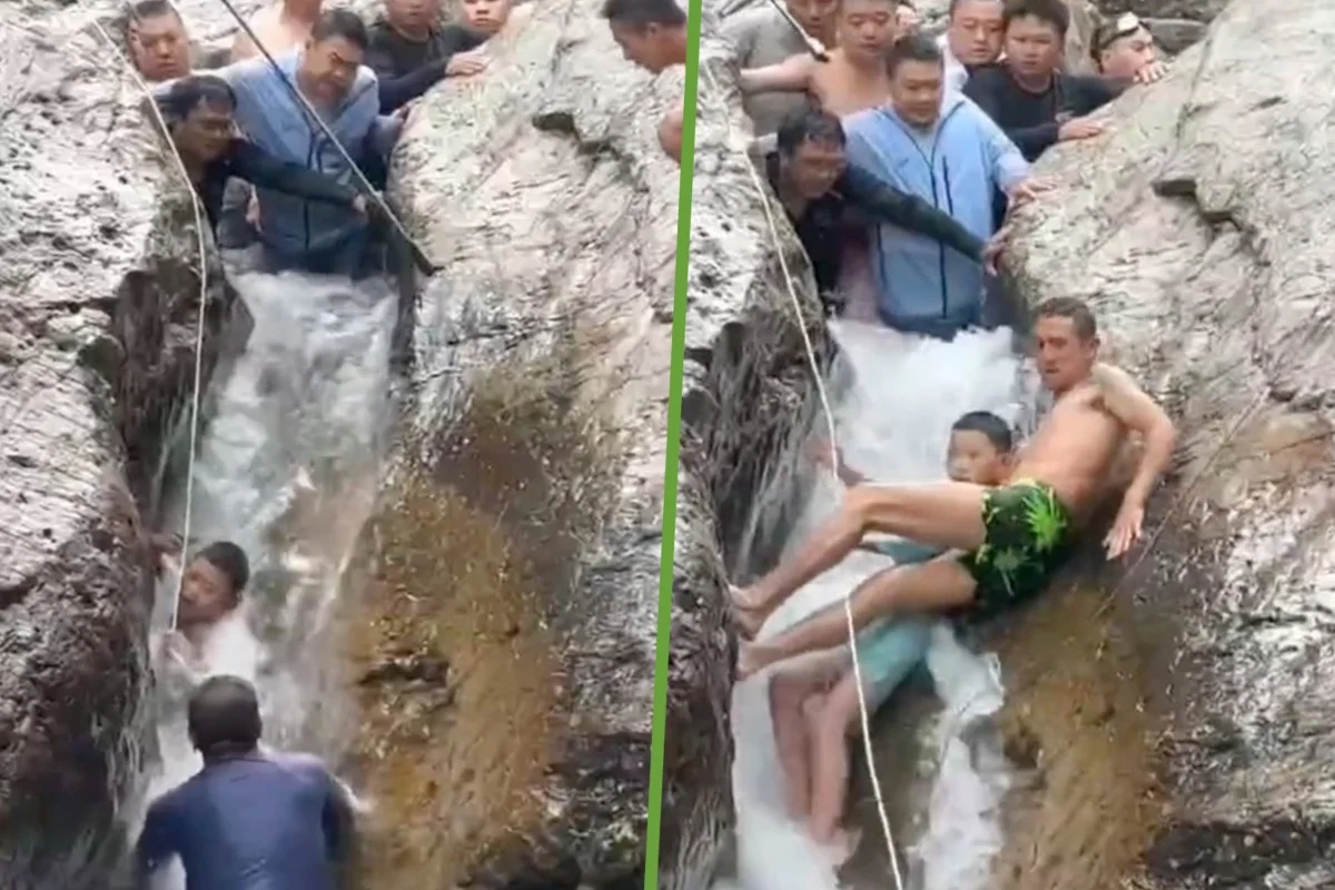 O resgate foi tenso, mas no final os turistas conseguiram retirar o menino das pedras e salvar a vida dele. - Foto: Douyin