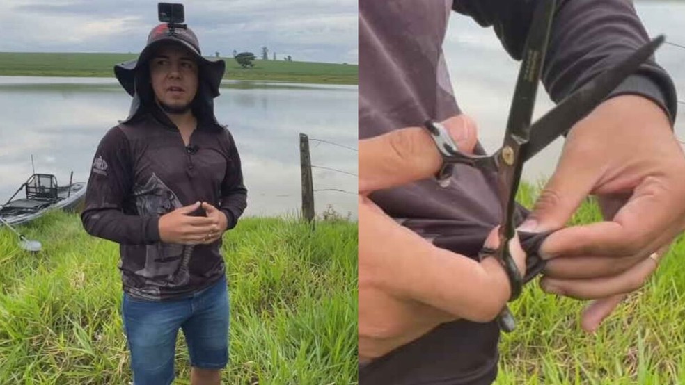 Pescador usou uma tesoura para libertar sucuri presa em rede no Tietê, em Cafelândia (SP) — Foto: Reprodução/TV TEM