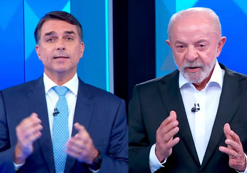 No ataque capacitista, o Senador Flávio Bolsonaro ironizou o dedo perdido por Lula em acidente de trabalho. O Presidente exigiu respeito aos trabalhadores e a reação viralizou nas redes sociais com a hashtag #somostodos9dedos. - Fotos: reprodução/ TV Globo