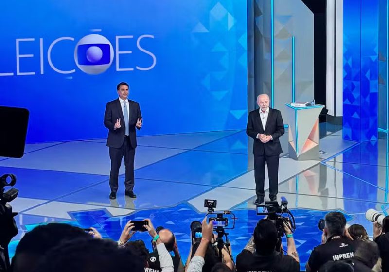 Agências de checagem apontam mais declarações falsas e enganosas de Flávio Bolsonaro do que de Lula. Veja o que foi desmentido no último debate. - Foto: reprodução/ TV Globo
