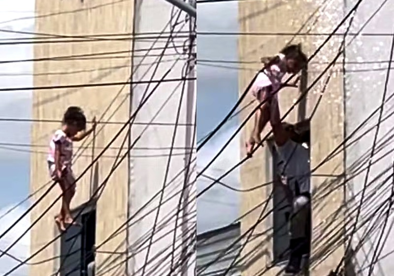 Policial militar salva menina de 4 anos que ficou pendurada na fiação elétrica após cair do segundo andar de uma casa em Alagoas. Foto: Reprodução/Ítalo Timóteo.